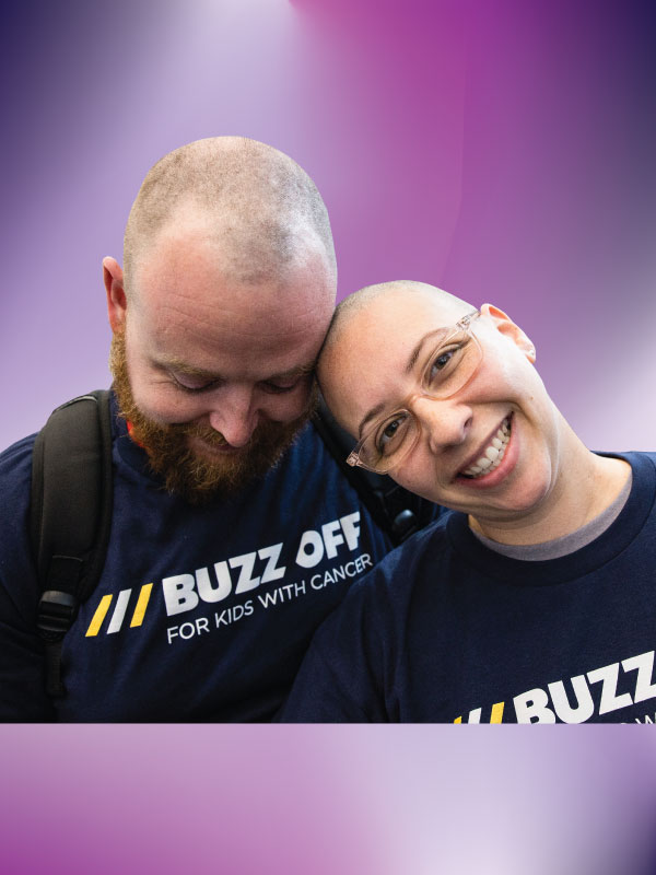 Buzz couple leaning bald heads in and smiling web mobile